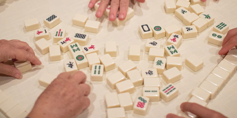 Chinese Family Playing Mahjong