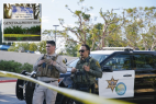 Police stand guard at site of fatal church shooting in California